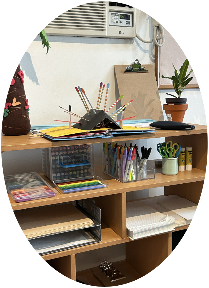 Shelves of art supplies and colorful materials